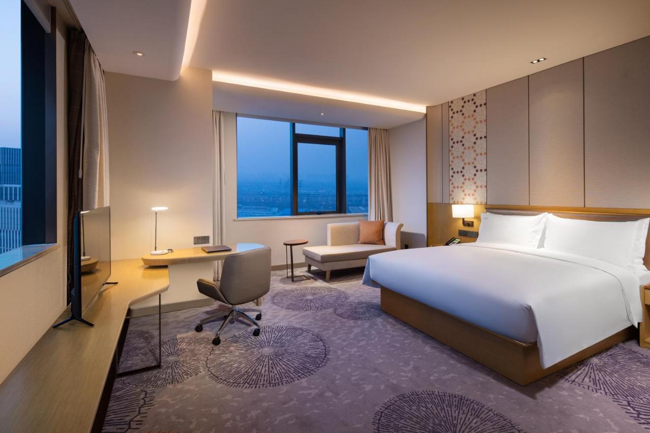 Holiday Inn Tianjin Xiqing By Ihg Экстерьер фото