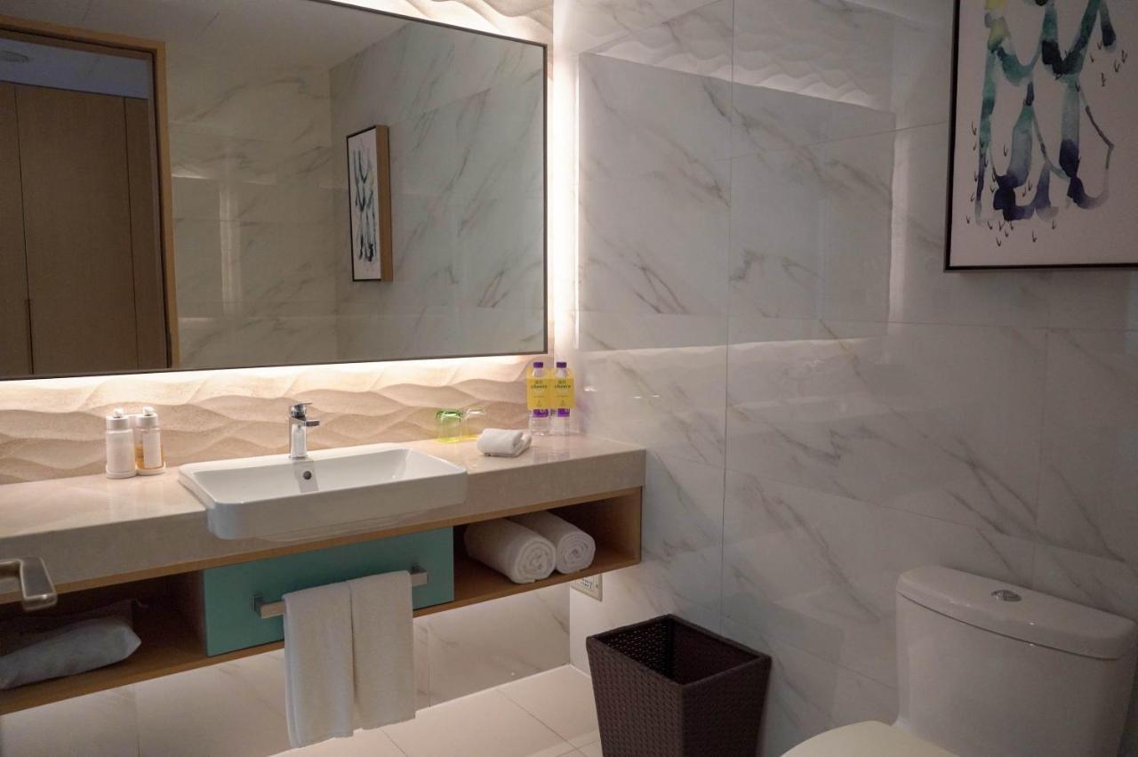 Holiday Inn Tianjin Xiqing By Ihg Экстерьер фото