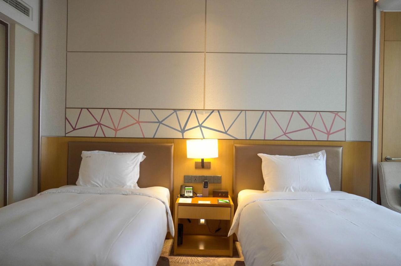 Holiday Inn Tianjin Xiqing By Ihg Экстерьер фото