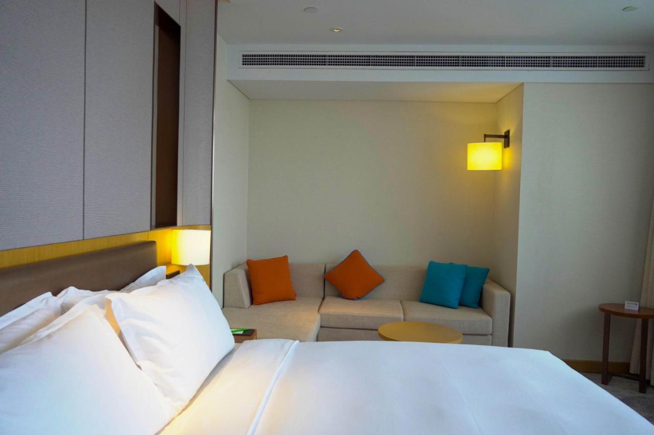 Holiday Inn Tianjin Xiqing By Ihg Экстерьер фото
