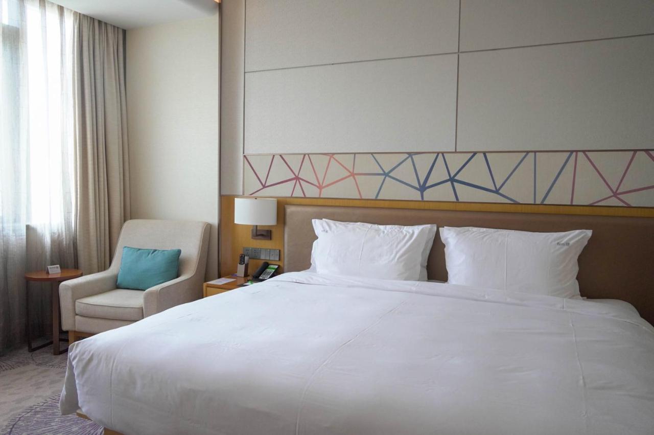 Holiday Inn Tianjin Xiqing By Ihg Экстерьер фото