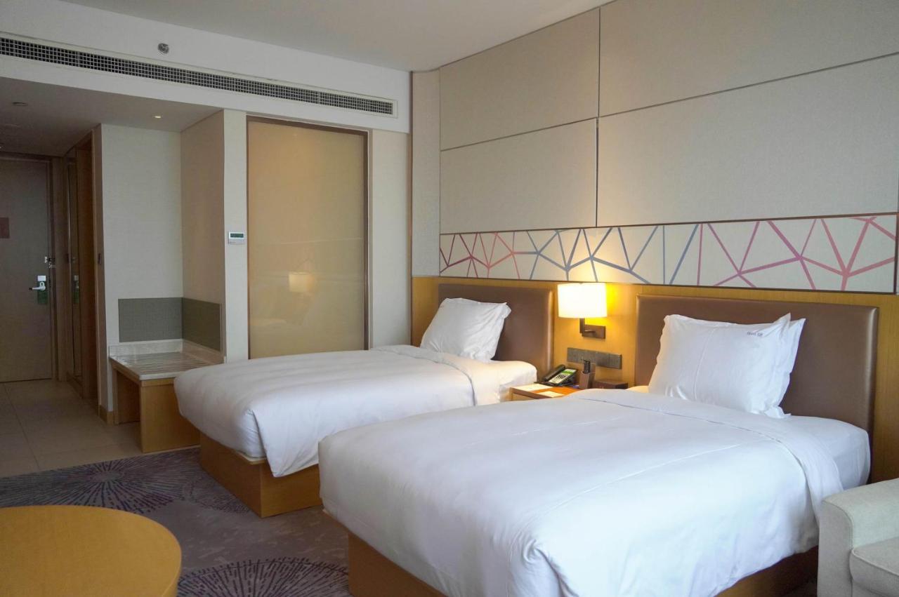 Holiday Inn Tianjin Xiqing By Ihg Экстерьер фото