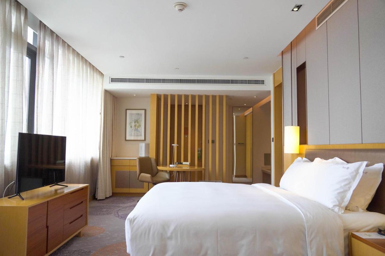 Holiday Inn Tianjin Xiqing By Ihg Экстерьер фото